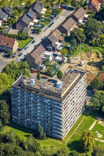 Aerial view, problem high-rise building Steinstraße and construction site new development area,