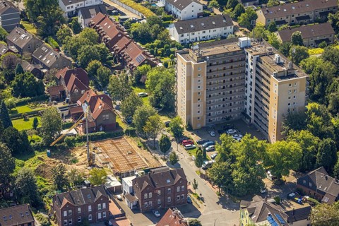 Aerial view, problem high-rise building Steinstraße and construction site new development area,