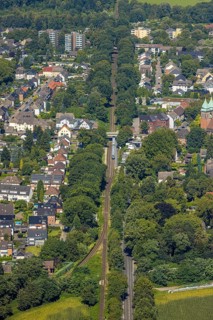Aerial view, railway line with suburban railway, green trees, bridge Beethovenstraße, Zweckel,
