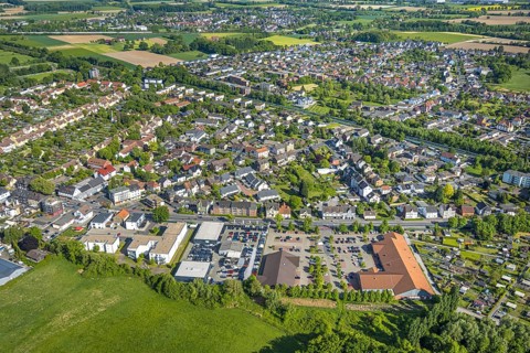 Aerial view, view of Pelkum, shopping centre with Edeka Weber and Aldi supermarket, Excellence Cars