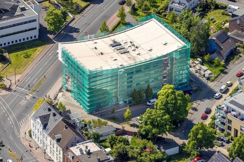 Aerial view, renovation of the municipal music school, construction site with scaffolding and