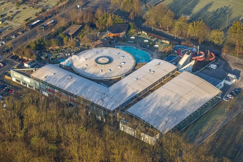 Aerial view, Maximare adventure pool with indoor and outdoor pools, slides, aqua fitness