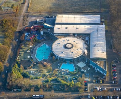 Aerial view, Maximare adventure pool with indoor and outdoor pools, slides, aqua fitness