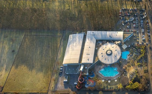 Aerial view, Maximare adventure pool with indoor and outdoor pools, slides, aqua fitness