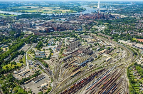 Aerial view, reserve parts centre Duisburg thyssenkrupp Steel Europe AG and goods station, rear