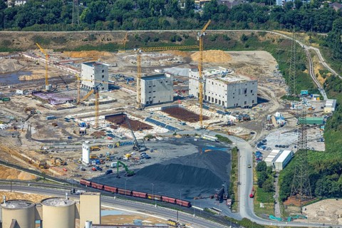 Aerial view, construction site with new construction of electrical switching houses for direct