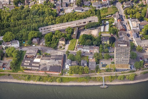 Aerial view, river Rhine and Hotel Rheingarten high-rise, abandoned former factory Schmitz Söhne
