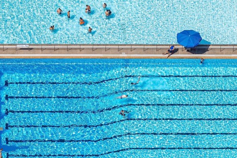 Aerial view, outdoor swimming pool Homberg with swimming pool and bathers, lifeguard with parasol