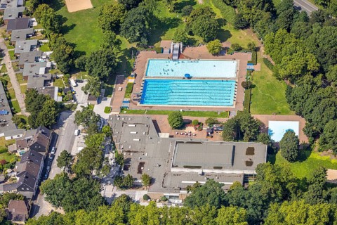 Aerial view, outdoor swimming pool Homberg with swimming pool and bathers, lifeguard with parasol