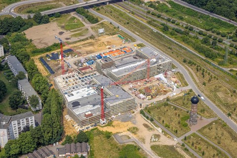 Aerial view, construction site with new building at the former Wedau marshalling yard for a new