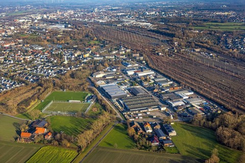 Aerial view, goods station, view of Daberg district with Schieferstraße industrial estate, TuS