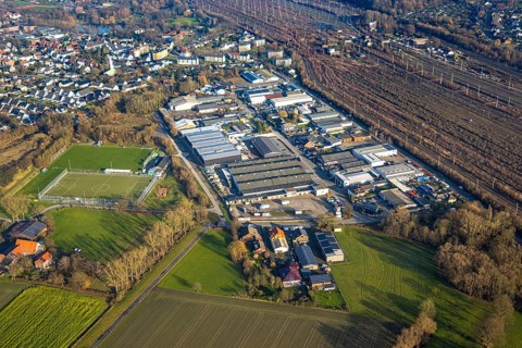 Aerial view, goods station, view of Daberg district with Schieferstraße industrial estate, TuS