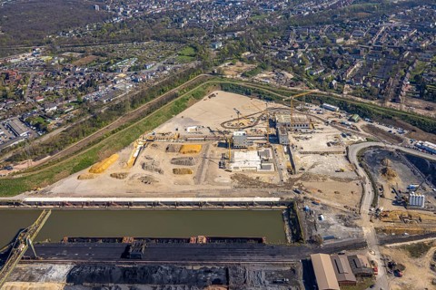 Aerial view, construction area with building site at the southern harbour, direct reduction plant