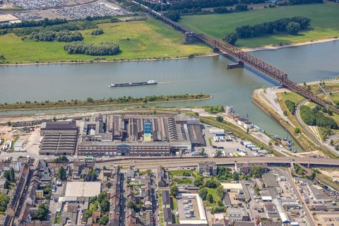 Aerial view, Hochfeld railway bridge over the river Rhine, cult harbour and Alga site, planned