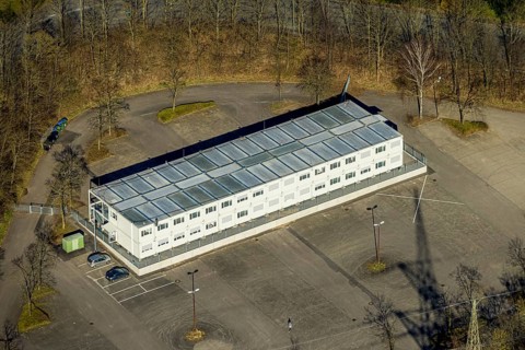 Aerial photo, refugee accommodation container village Kirchenberg at Erich-Berlet-Stadion,