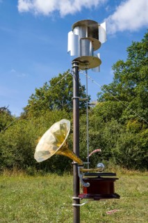 The object Music of the Weather Cycle- wind driven record player and Wind Driven AI Generator by