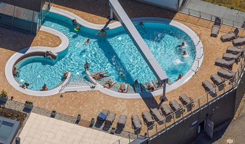 Aerial view, saltwater pool of the Olpe leisure pool, outdoor pool and indoor pool with sun