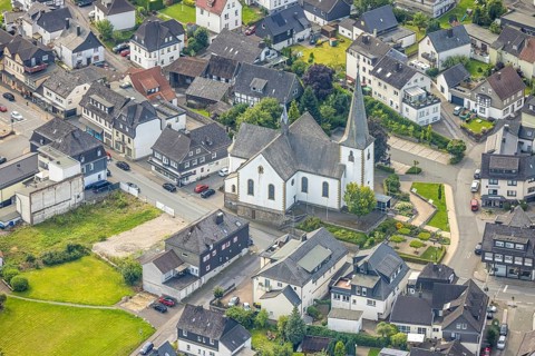 Aerial view, catholic St. Nikolaus parish church in the town centre, Freienohl, Meschede,