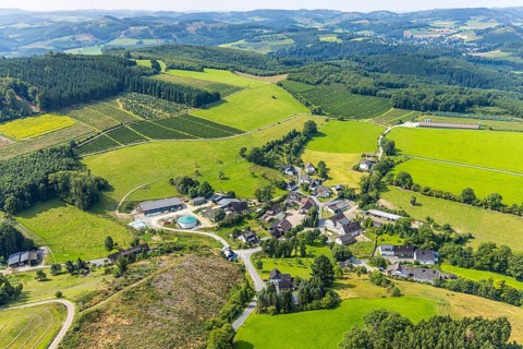 Aerial view, residential area local view district Büemke with chapel St. Agatha, meadows and fields