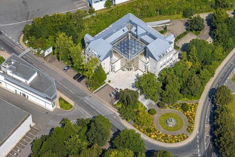Aerial view, house with glass roof, flower bed and fountain of the brewery C. & A. VELTINS GmbH,