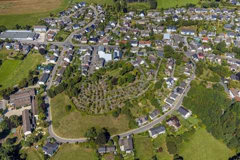 Aerial view, Evangelical church Oberbrügge and evang. Cemetery, residential area on Heerstraße,