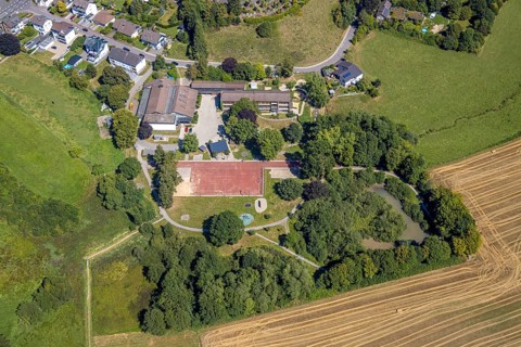 Aerial view, Kita Wunderland day care centre and children's and youth club Die Insel, sports field,