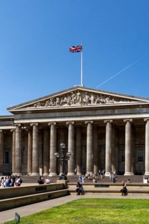 London, United Kingdom - 14 May 2025: Tourists gathering on the steps of the famous British Museum