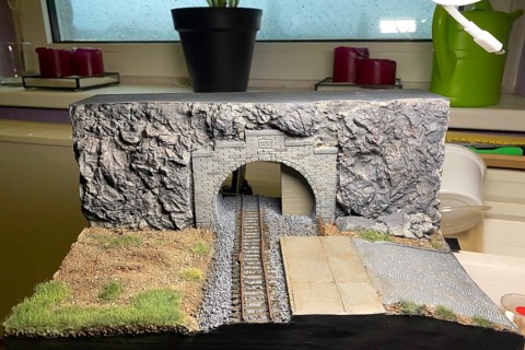 Model making diorama: railway tunnel with tracks and rocky landscape, Haan, North Rhine-Westphalia,