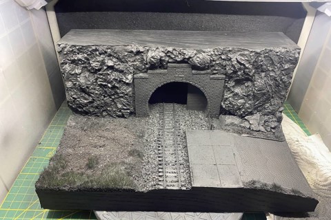 Modelling diorama: tunnel portal, tracks and rocky landscape in the shell, Haan, North