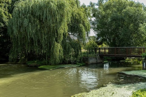 Bridge over river Erft near Paffendorf with pasture in the foreground, Paffendorf, North