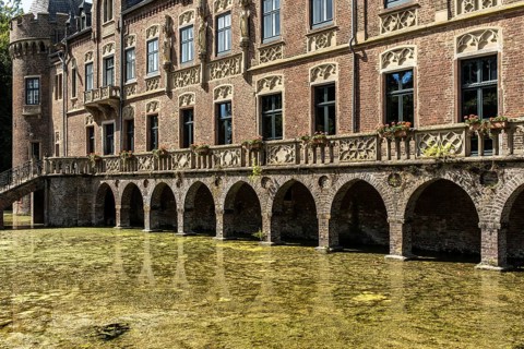 Paffendorf Castle with arcades on the moat, Paffendorf, North Rhine-Westphalia, Germany