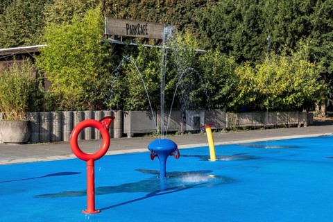 Water playground with red ring and fountain, Cologne green belt, North Rhine-Westphalia