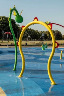 Water playground with large yellow arch, green belt, Cologne, North Rhine-Westphalia