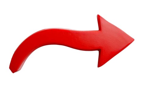 A bright red arrow curves gracefully against a clean white background, symbolizing direction and