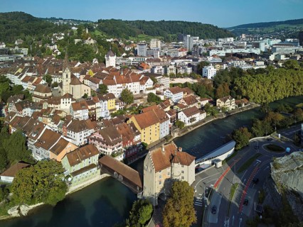 View of the old town with the parish church of Maria Himmelfahrt, in the background the ruins of