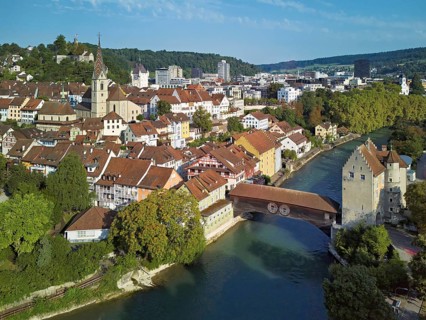 View of the old town with the parish church of Maria Himmelfahrt, in the background the ruins of