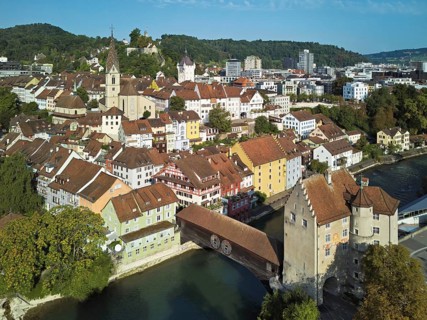 View of the old town with the parish church of Maria Himmelfahrt, in the background the ruins of
