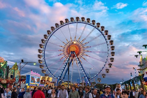 Ferris wheel at Oktoberfest 2024 at dusk, Munich, Bavaria, Germany