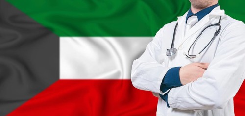 Kuwait healthcare concept. Male doctor on Kuwait flag. Doctor with crossed arms on Kuwait flag