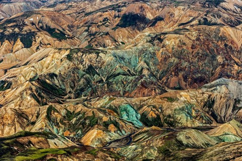 Mountain landscape, snowfields, sunny, summer, volcanic landscape, aerial view, ryolite rock