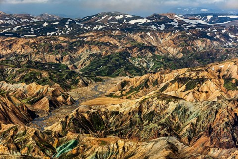 Mountain landscape, snowfields, sunny, summer, volcanic landscape, aerial view, ryolite rock