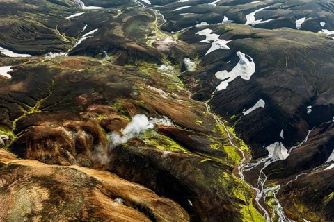 Mountain landscape, sunny, summer, hot springs, snowfields, volcanic landscape, aerial view,
