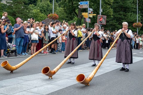 Bank holidays alphorn players, Interlaken, Switzerland