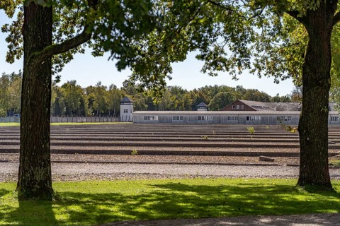 Foundations of the prisoners' barracks and watchtower, Dachau Concentration Camp Memorial, Bavaria,