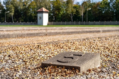 Foundations of the prisoners' barracks and watchtower, Dachau Concentration Camp Memorial, Bavaria,