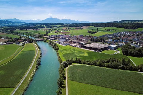 River Reuss right view of the village with the industrial area, Sins, Freiamt, Canton, Aargau,
