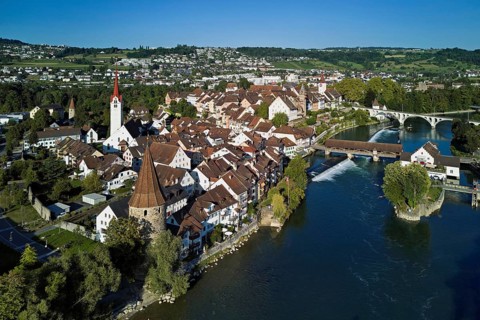 Old town with the Catholic Church of St. Nicholas, the tower of the Muri- Amthof and the witches'