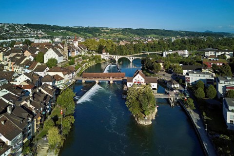 Old town with the tower of the Muri- Amthof, in the centre the weir and the old wooden bridge