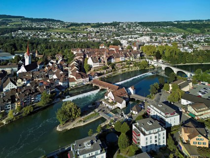 Old town with the Catholic Church of St Nicholas and the tower of the Muri- Amthof, in the