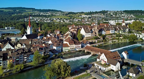 Old town with the Catholic Church of St Nicholas and the tower of the Muri- Amthof, in the